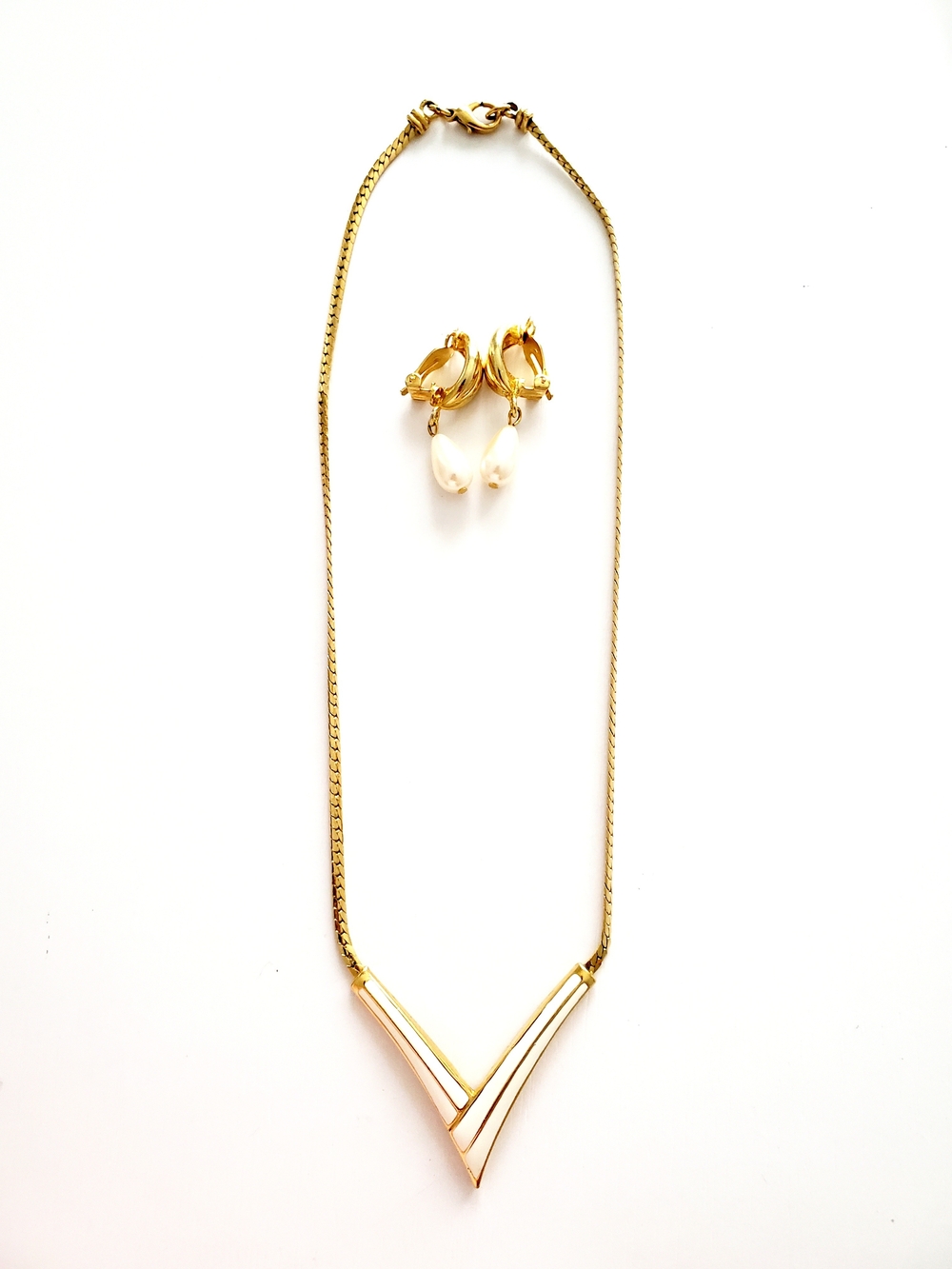 Gold V-Shaped Pendant Necklace with Pearl Drop Clip-On Earrings. 1980s